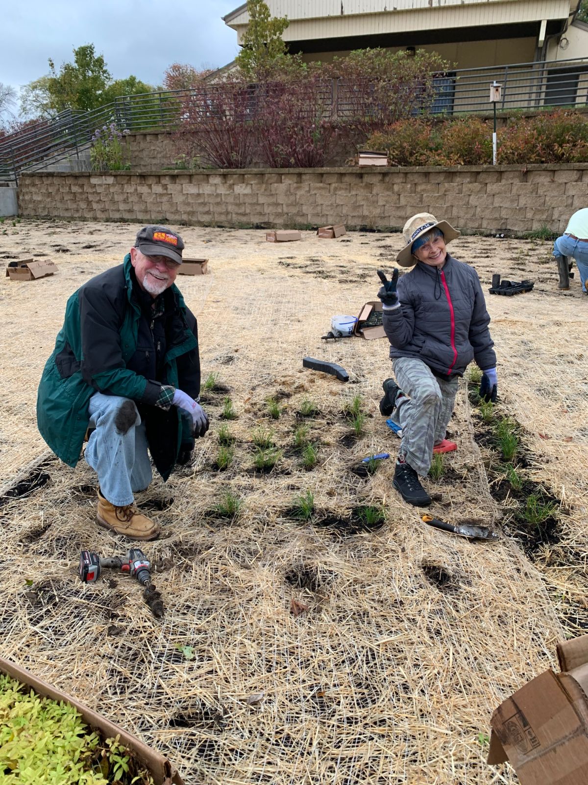Bruce & Mimi working on a project with the Whitefish Bay Garden Club. Planting native plantings to curb runoff and attract pollinators.